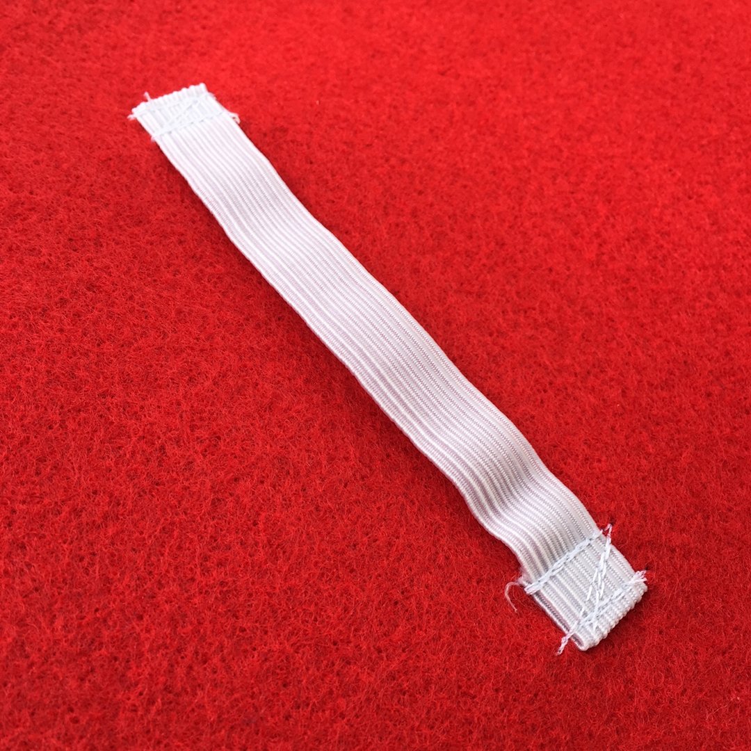 back view of Kids Superhero Felt Shield with elastic band for child to hold, soft and flexible, safe option for shield toy by Creative Capes