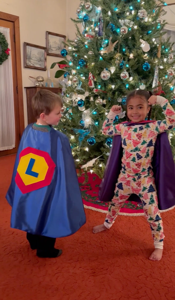 happy boy and girl in durable super hero costume by Creative Capes
