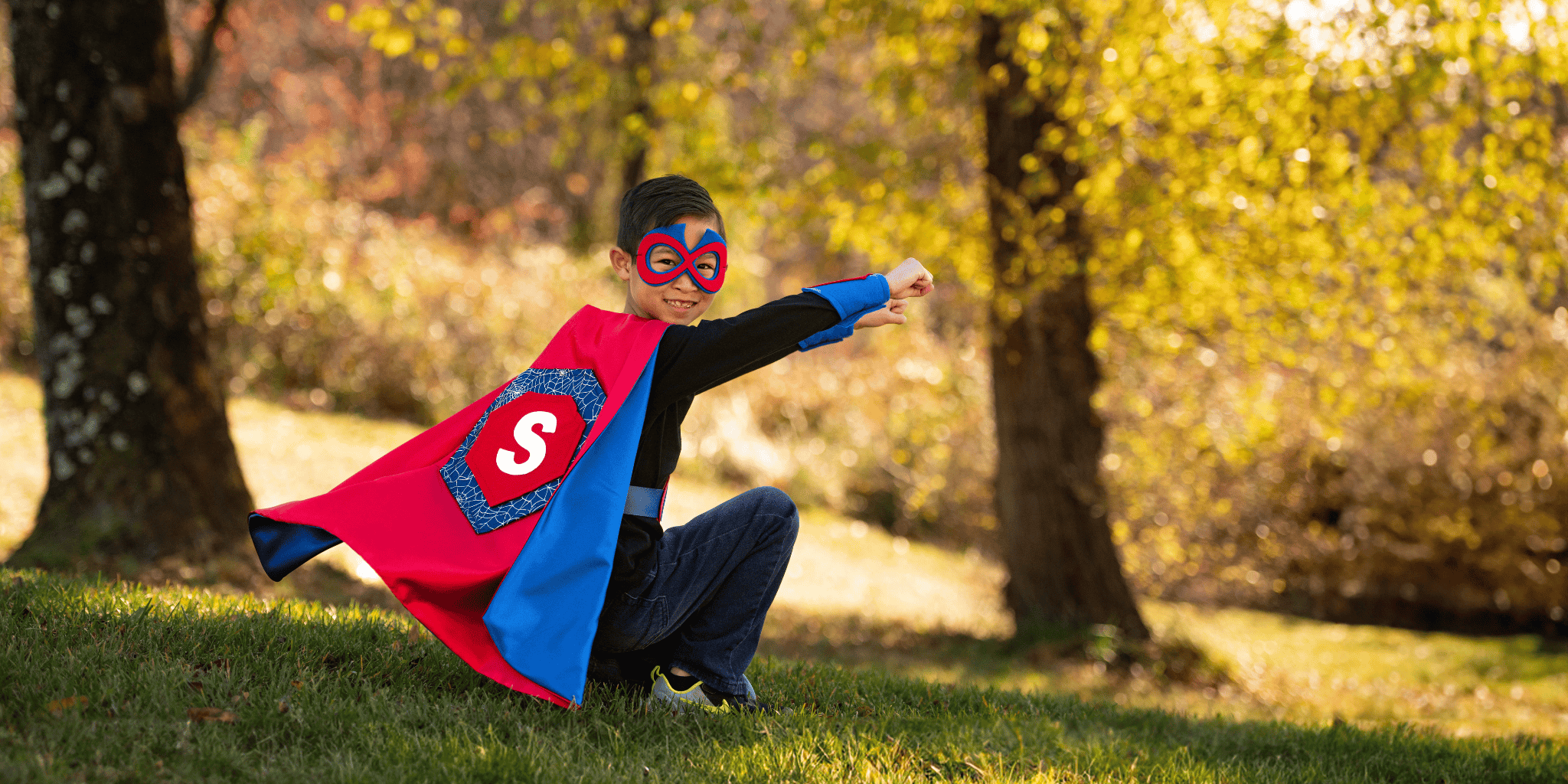 Boy in red and blue superhero costume with cape and mask, Quality and durable toy for creative child, scree-free activity that parents approve and kids love, open-ended play gift