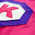 closeup of pink and purple personalized emblem, quality materials, made for active play, constructed to last, handmade capes by Creative Capes for kids