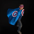 boy in Red, White, and Blue superhero costume, satin cape is personalized with the child's first initial, imaginative play toy, healthy childhood play activities, Creative Capes, made in USA