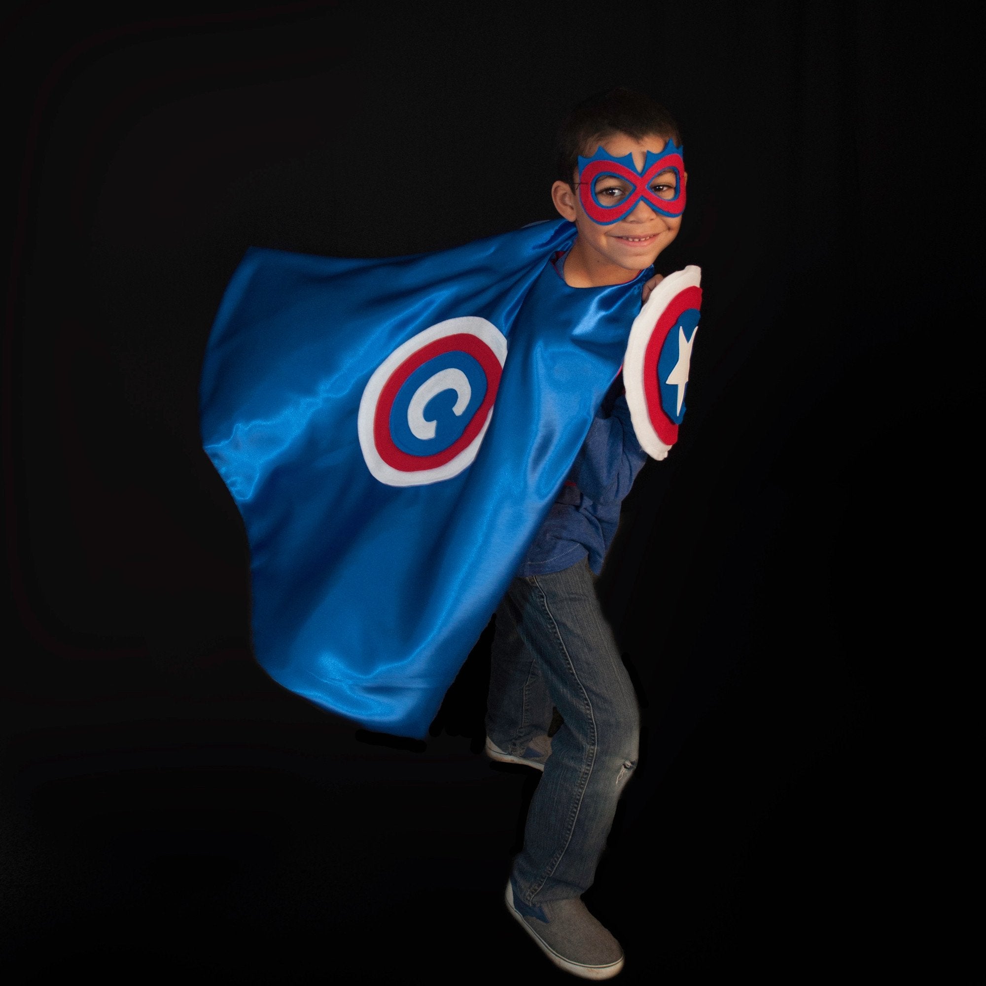 boy in Red, White, and Blue superhero costume, satin cape is personalized with the child's first initial, imaginative play toy, healthy childhood play activities, Creative Capes, made in USA