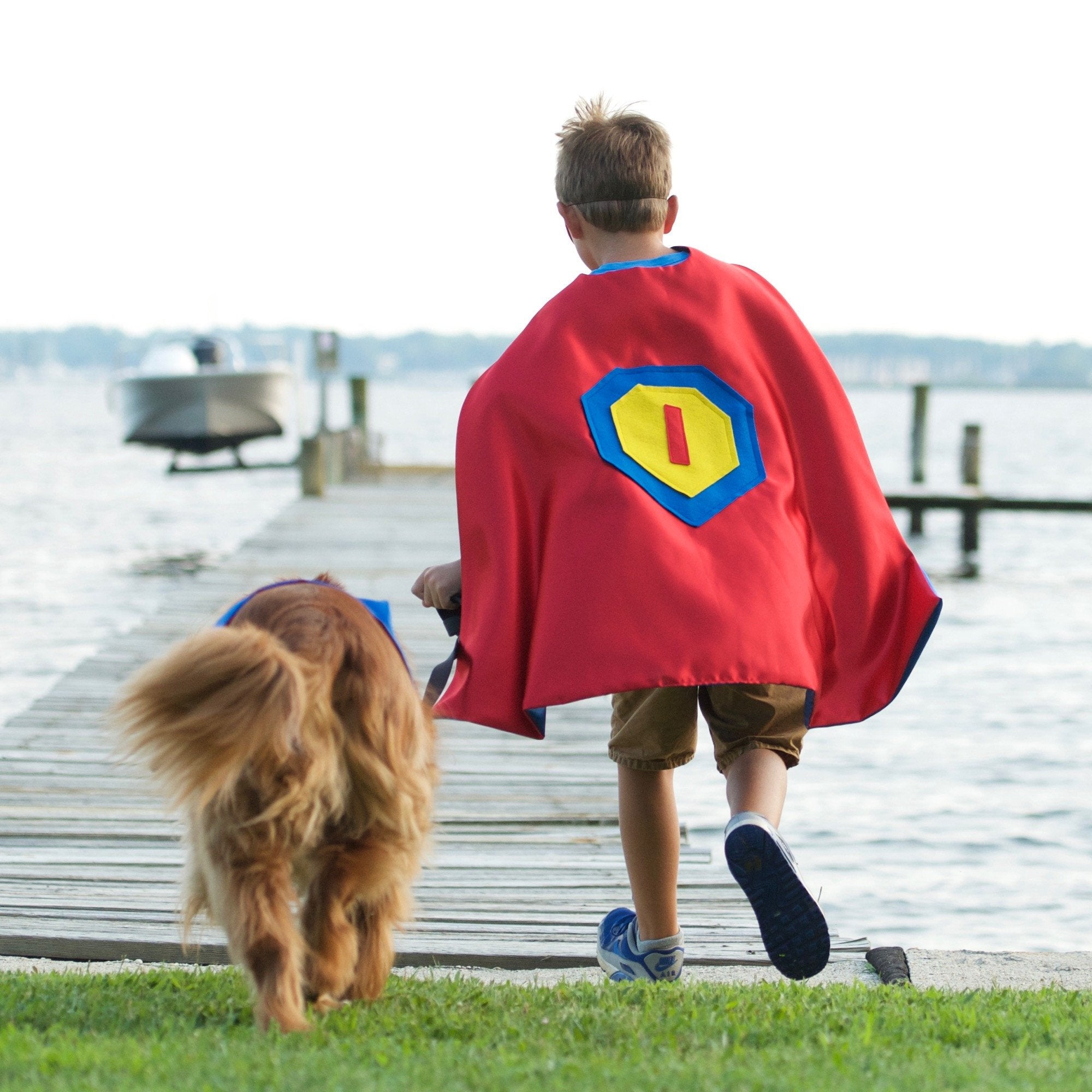 boy wearing red, blue and yellow personalized superhero costume set, quality satin, Handmade by Creative Capes in USA, dress up to inspire imaginative play and confidence