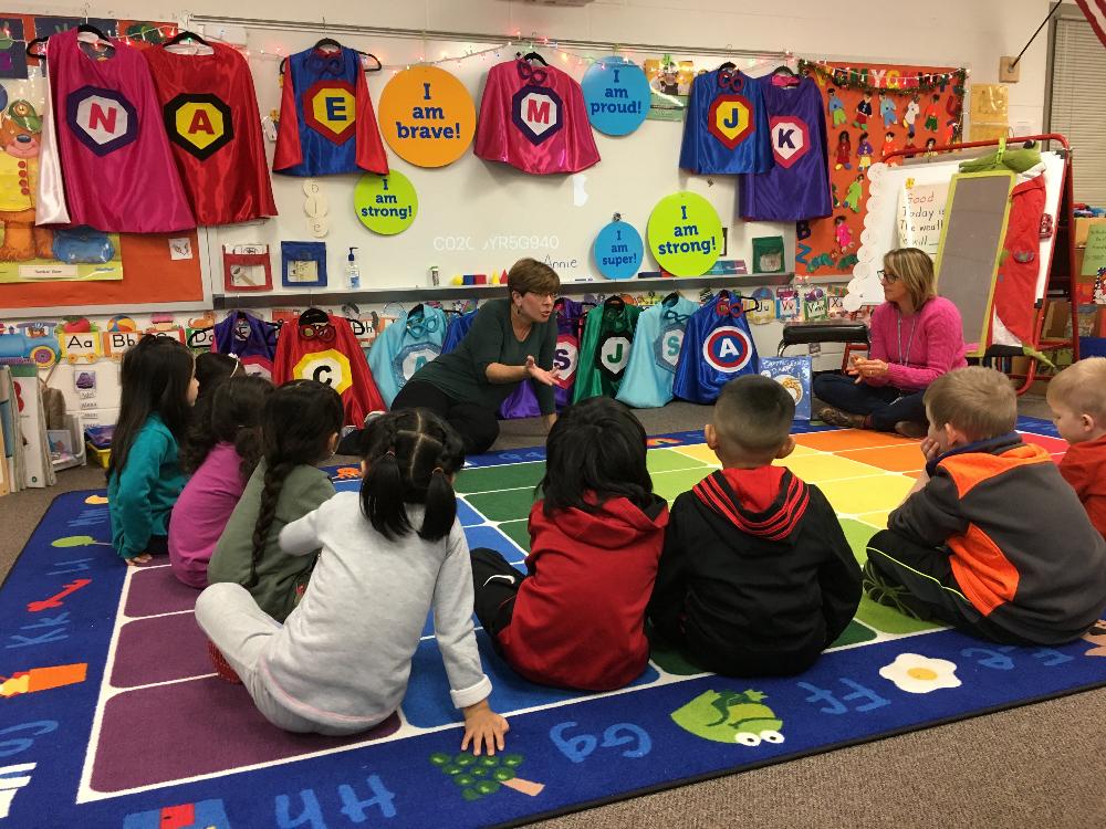 Holly from Creative Capes talks to preschoolers helping them discover their individual strengths with the help of a personalized cape and make