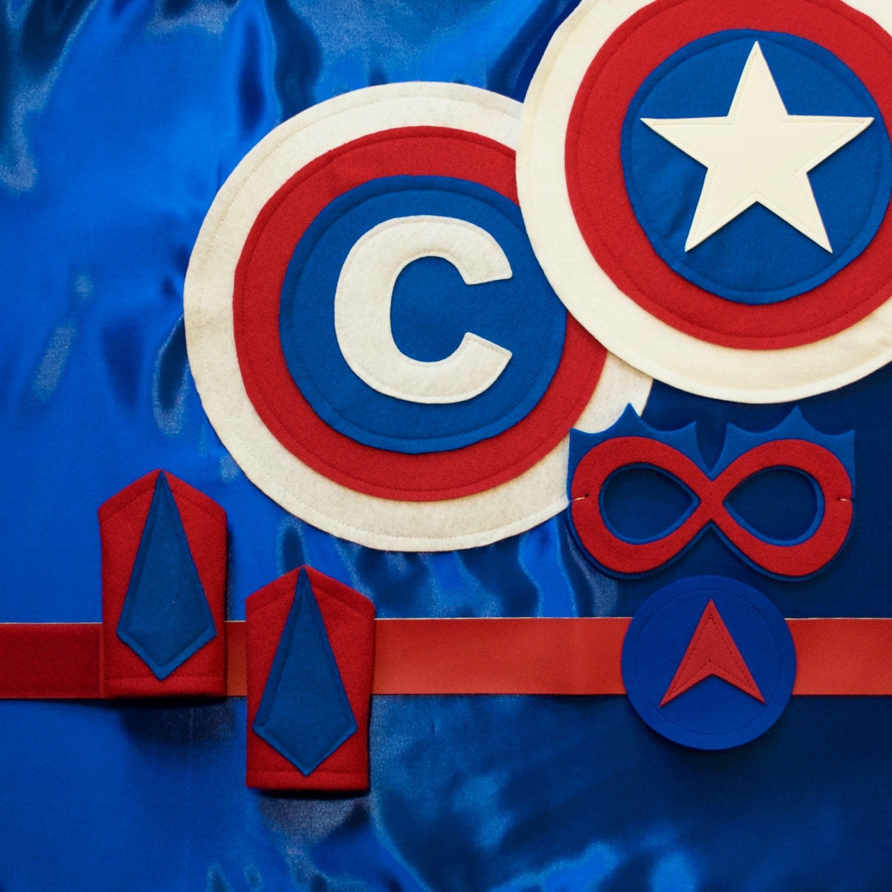 superhero costume in red, white and blue. Costume set - personalized satin cape, shield, eye mask, belt and wrist cuffs, Inspired by Captain America Fans, handmade by Creative Capes in the USA